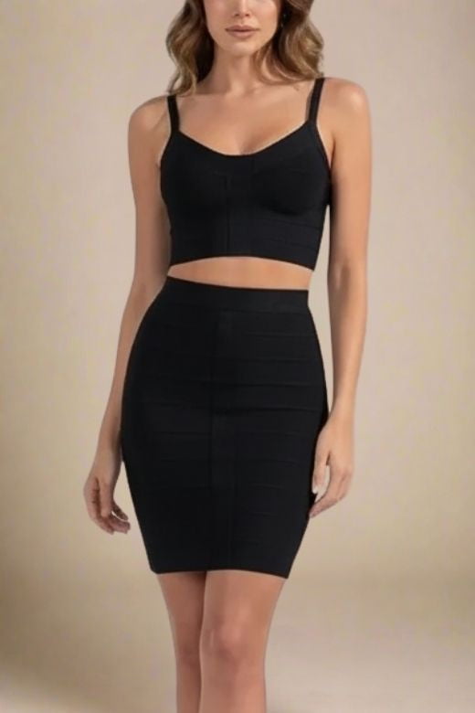 Woman wearing a figure flattering  India Bandage Top and Mini Skirt Outfit Set - Classic Black BODYCON COLLECTION