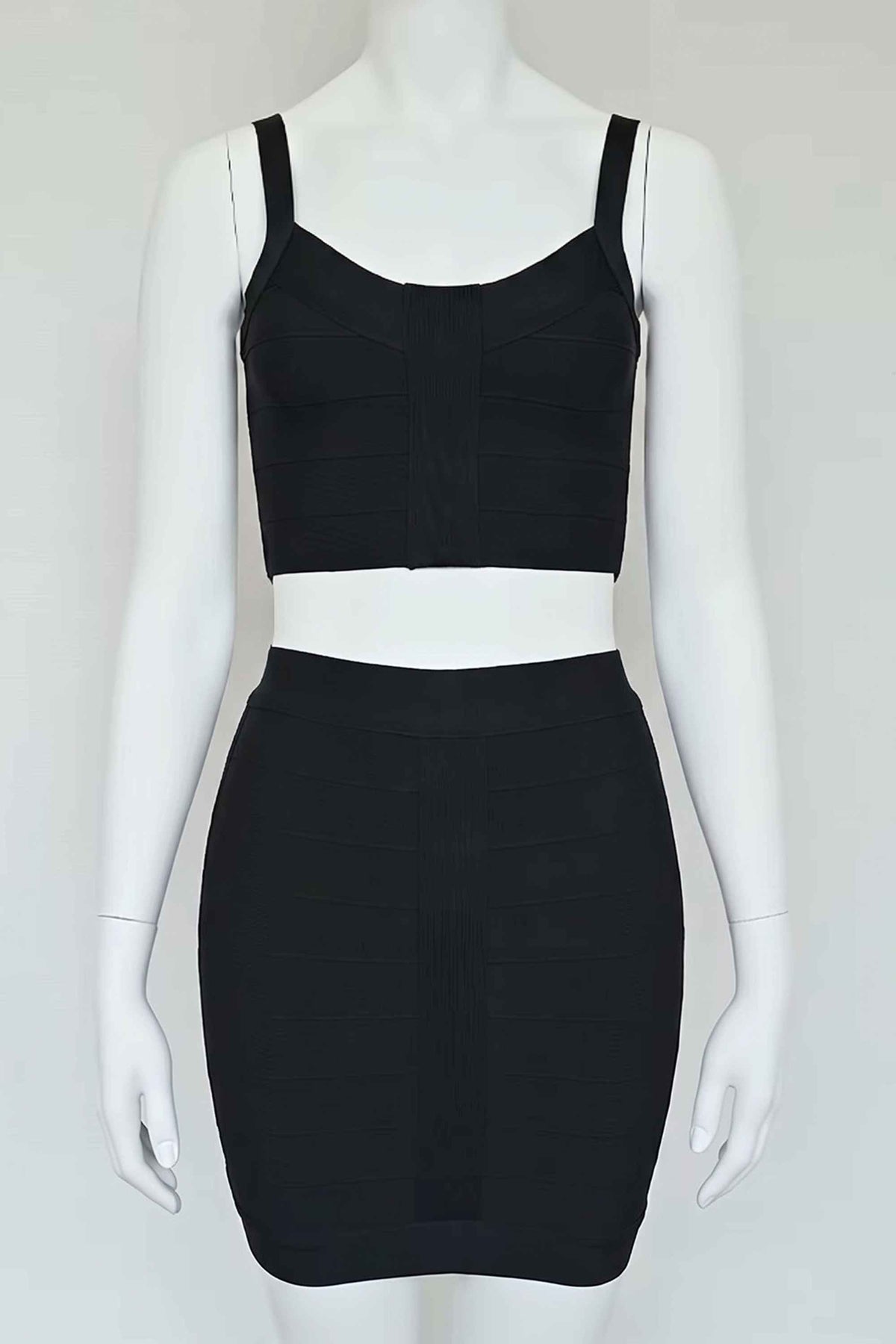 Woman wearing a figure flattering  India Bandage Top and Mini Skirt Set - Classic Black BODYCON COLLECTION