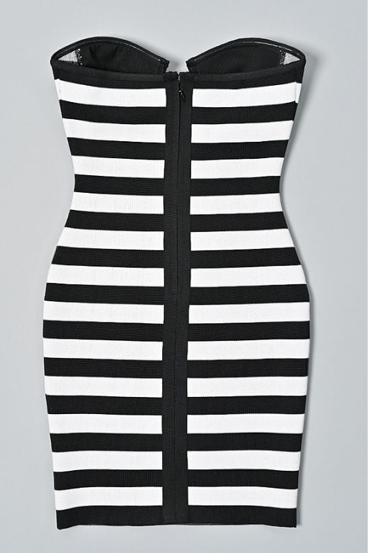 Woman wearing a figure flattering  Ingrid Bandage Mini Dress - Classic Black BODYCON COLLECTION