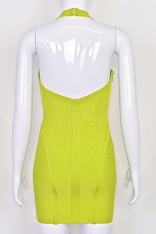 Woman wearing a figure flattering  Isabella Bandage Mini Dress - Neon Green BODYCON COLLECTION Pty Ltd