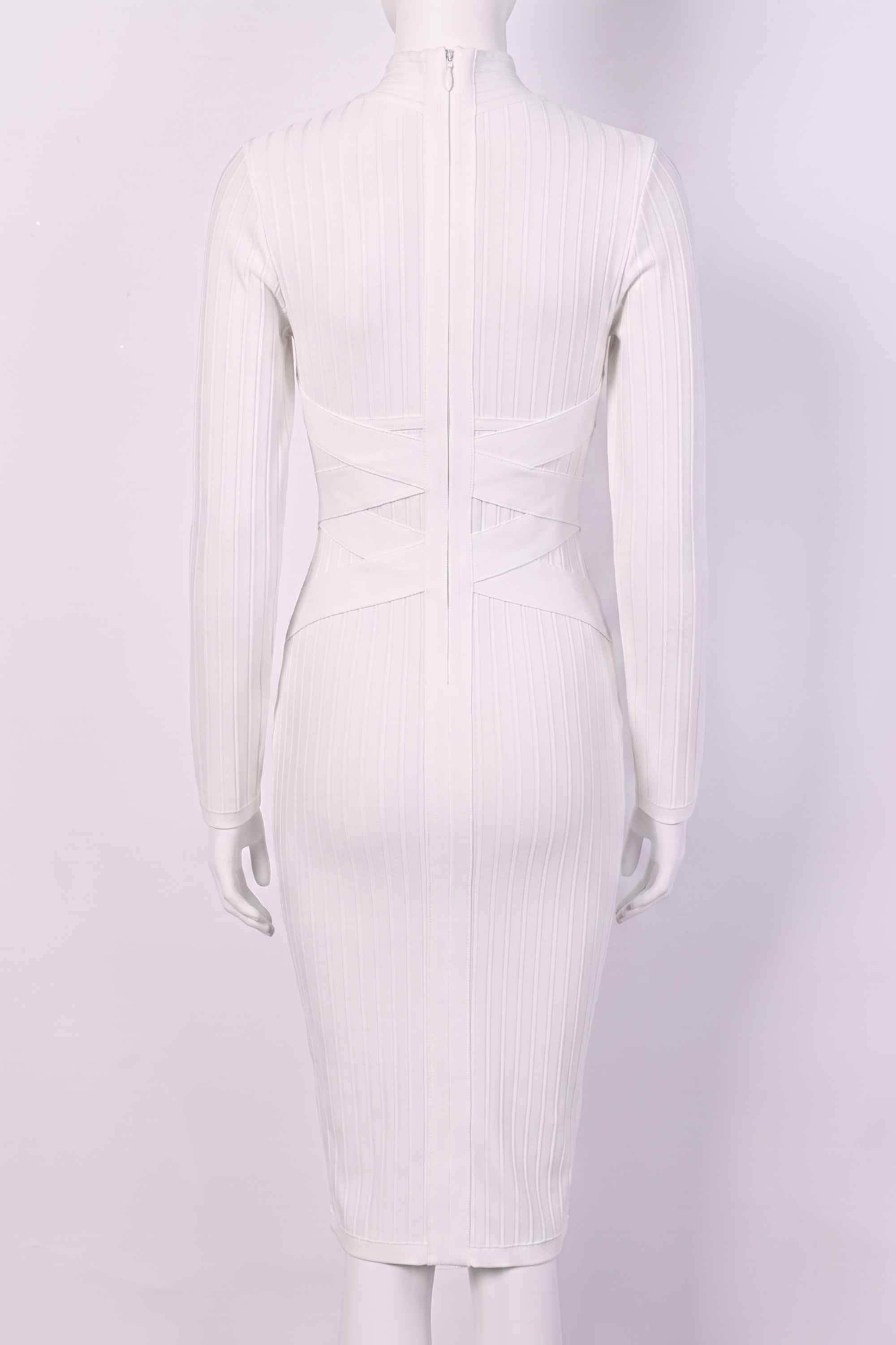 Woman wearing a figure flattering  Jane Long Sleeve Bodycon Midi Dress - Pearl White Bodycon Collection