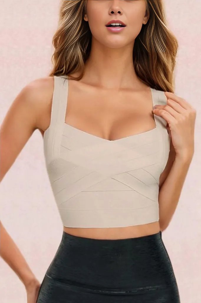 Woman wearing a figure flattering  Jay Bandage Crop Top - Cream BODYCON COLLECTION