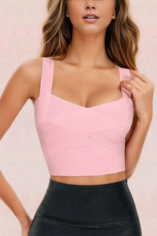 Woman wearing a figure flattering  Jay Bandage Crop Top - Dusty Pink BODYCON COLLECTION