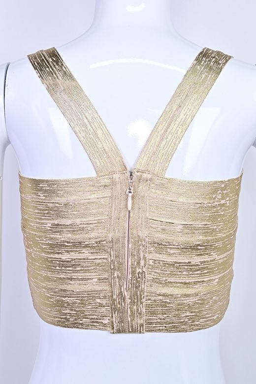 Woman wearing a figure flattering  Jay Bandage Crop Top - Gold BODYCON COLLECTION