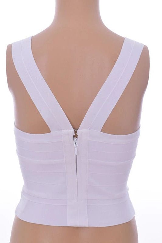 Woman wearing a figure flattering  Jay Bandage Crop Top - Pearl White BODYCON COLLECTION