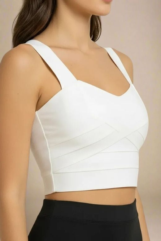 Woman wearing a figure flattering  Jay Bandage Crop Top - Pearl White BODYCON COLLECTION