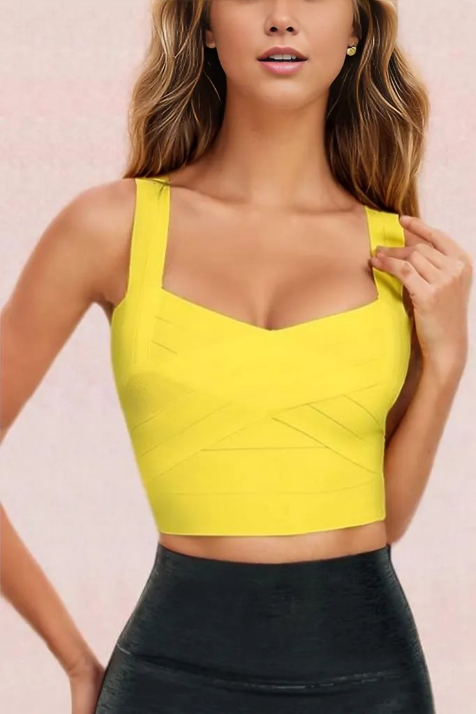 Woman wearing a figure flattering  Jay Bandage Crop Top - Sun Yellow BODYCON COLLECTION