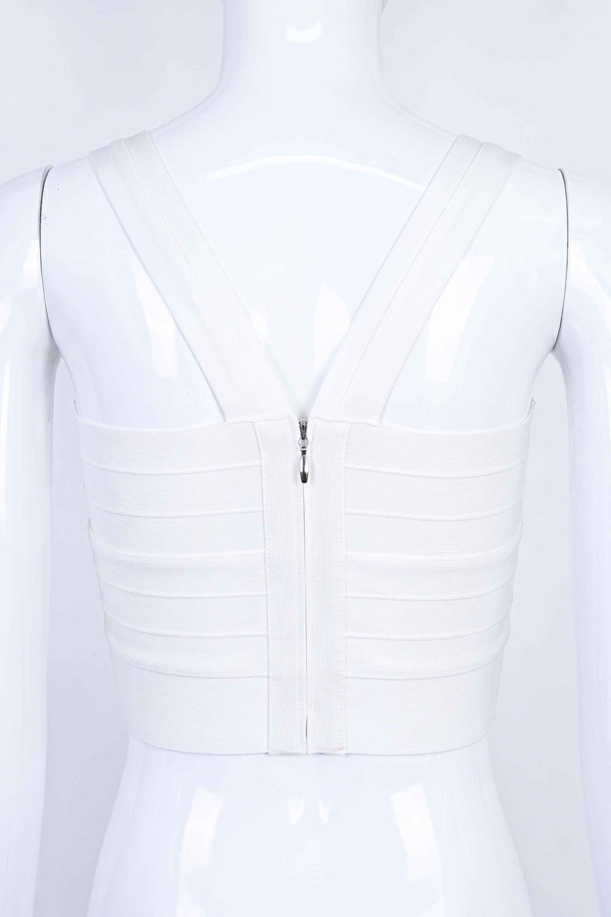 Woman wearing a figure flattering  Jay Bandage Crop Top - White Pearl BODYCON COLLECTION