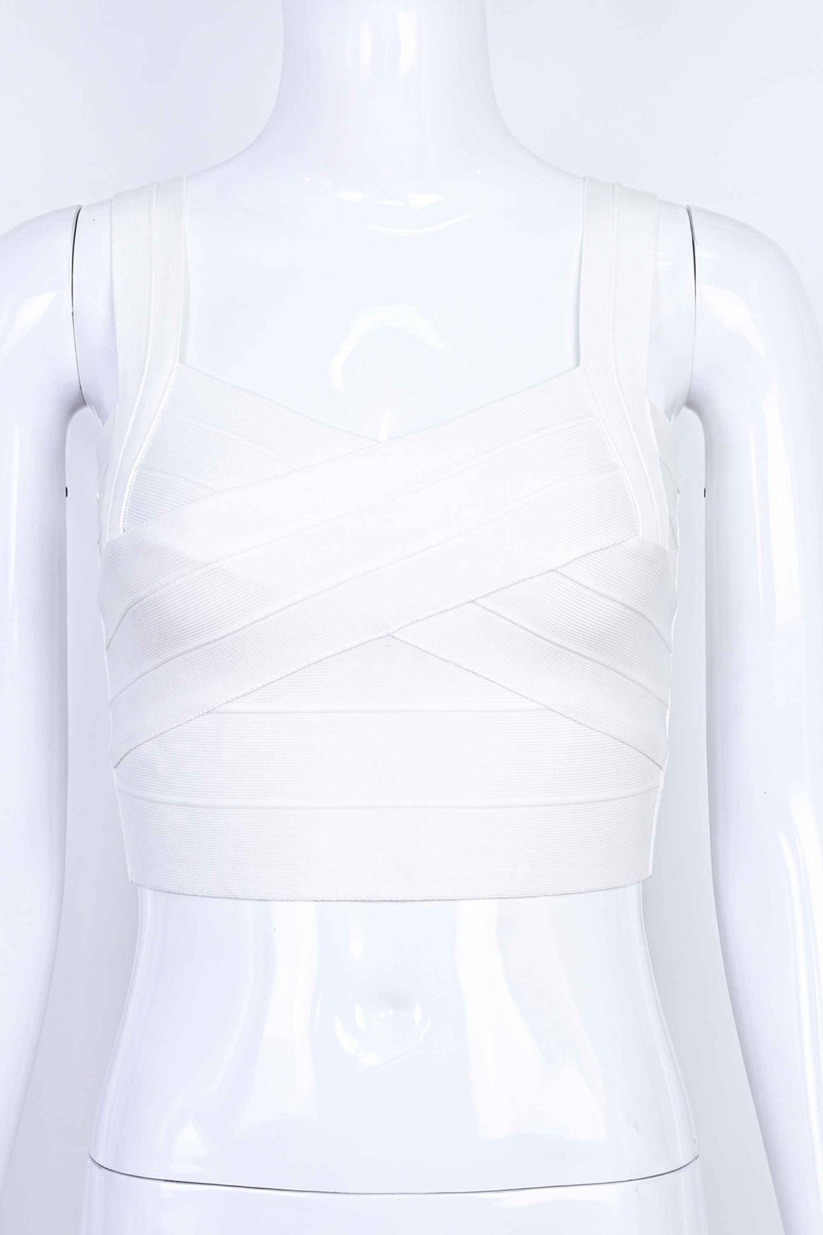 Woman wearing a figure flattering  Jay Bandage Crop Top - White Pearl BODYCON COLLECTION
