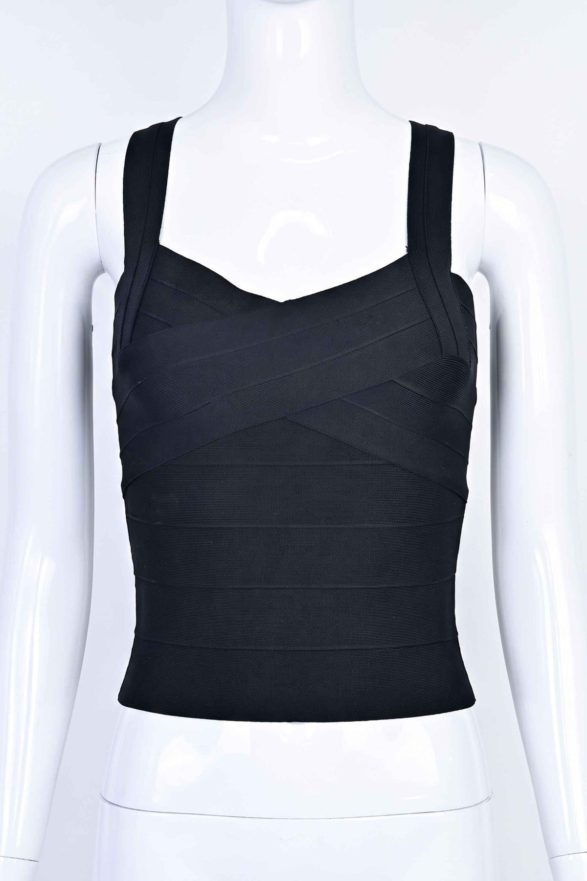 Woman wearing a figure flattering  Jay Bandage Top - Classic Black BODYCON COLLECTION