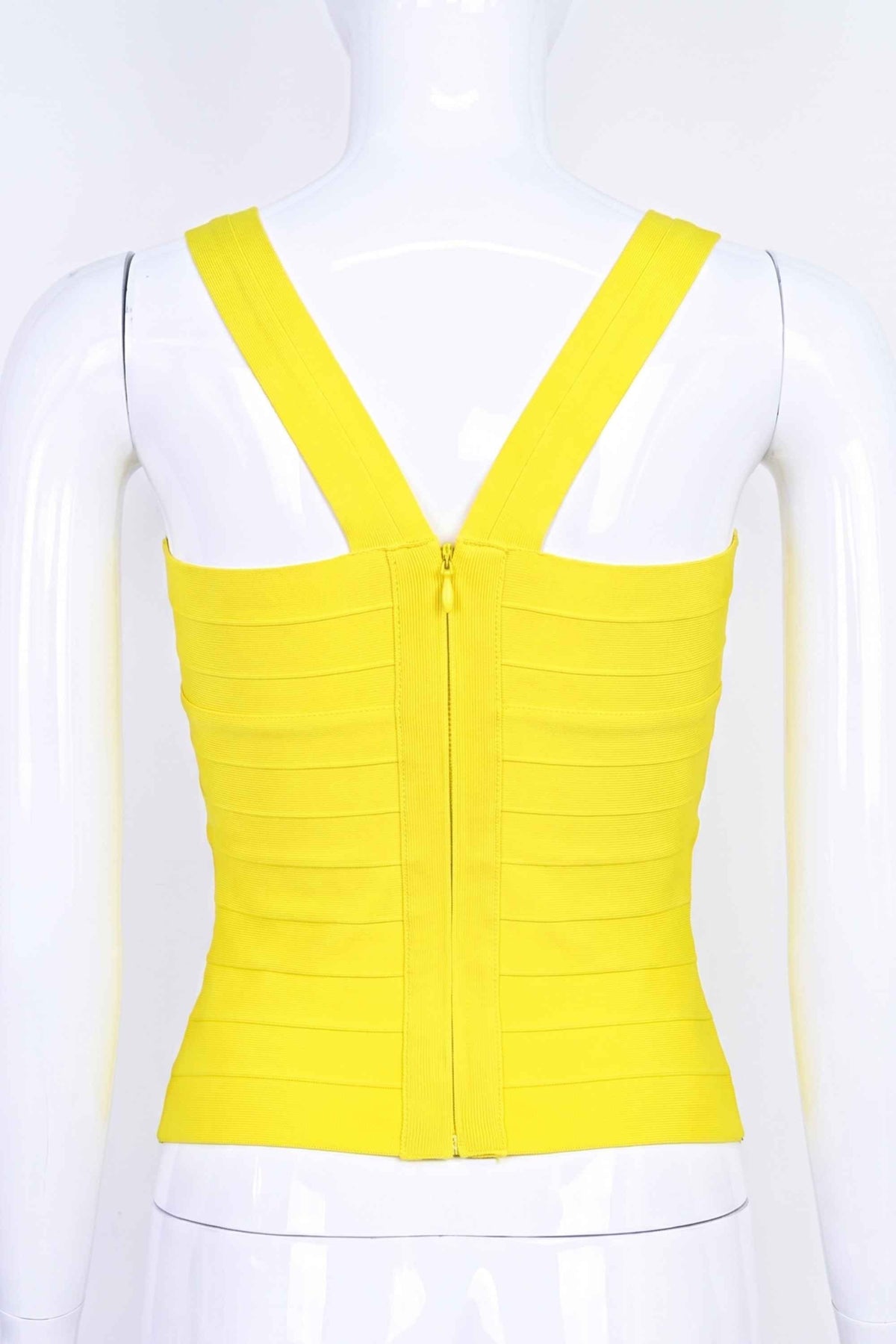 Woman wearing a figure flattering  Jay Bandage Top - Sun Yellow BODYCON COLLECTION