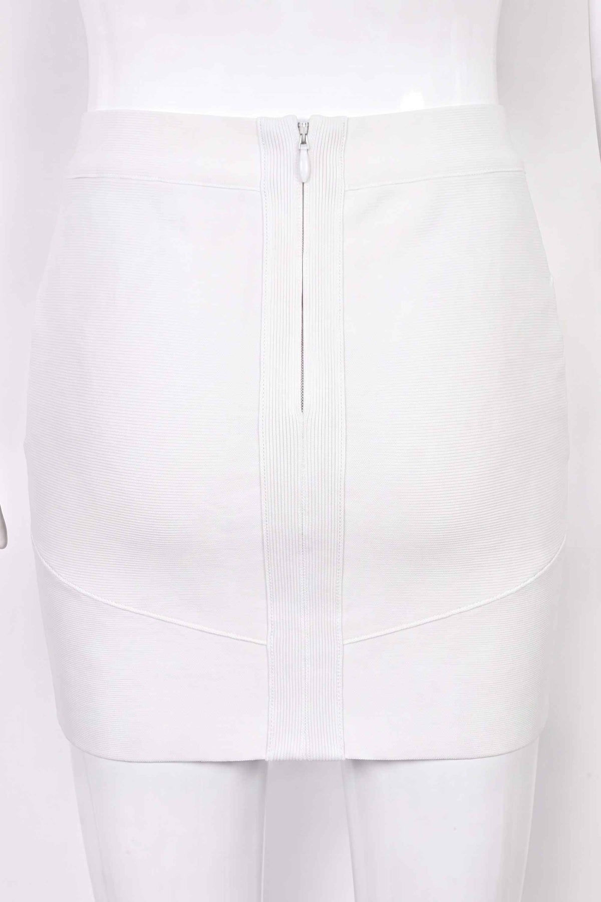 Woman wearing a figure flattering  Jay High Waist Bandage Mini Skirt - White Pearl BODYCON COLLECTION