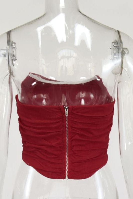 Woman wearing a figure flattering  Jen Mesh Bustier Top - Red Wine BODYCON COLLECTION