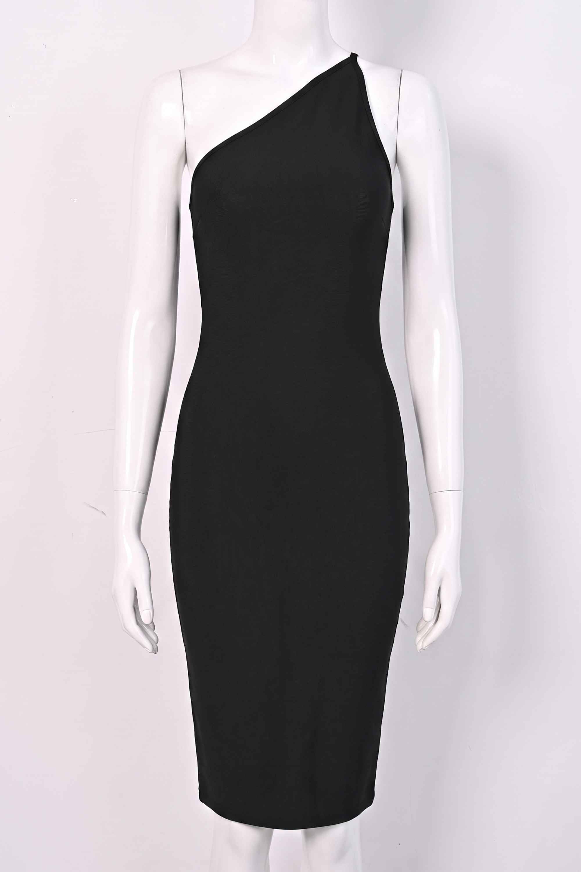 Woman wearing a figure flattering  Joi Bodycon Midi Dress - Classic Black Bodycon Collection
