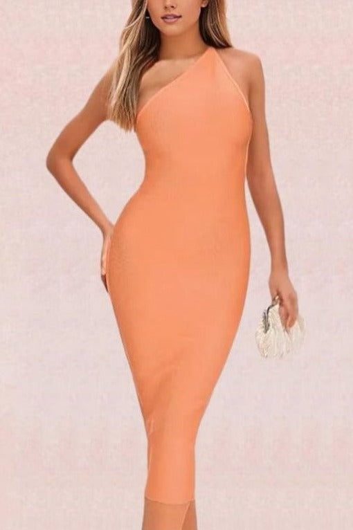 Woman wearing a figure flattering  Joi Bodycon Midi Dress - Peach Bodycon Collection