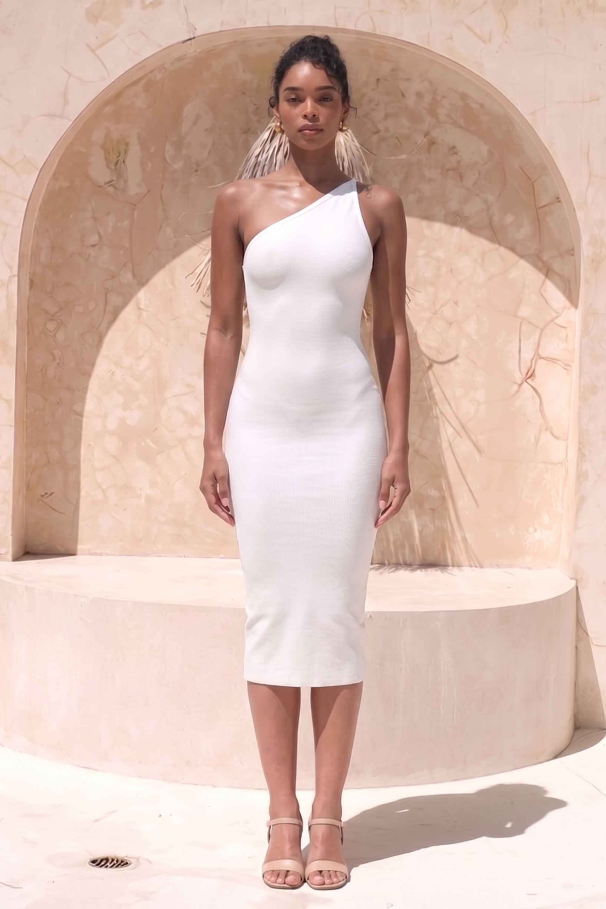 Woman wearing a figure flattering  Joi Bodycon Midi Dress - Pearl White Bodycon Collection