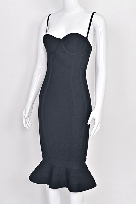 Woman wearing a figure flattering  Joy Bandage Midi Dress - Classic Black Bodycon Collection