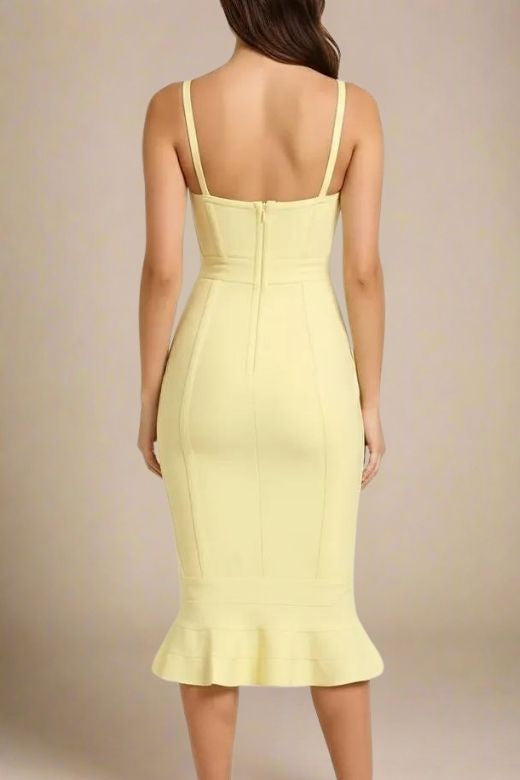 Woman wearing a figure flattering  Joy Bandage Midi Dress - Sun Yellow Bodycon Collection