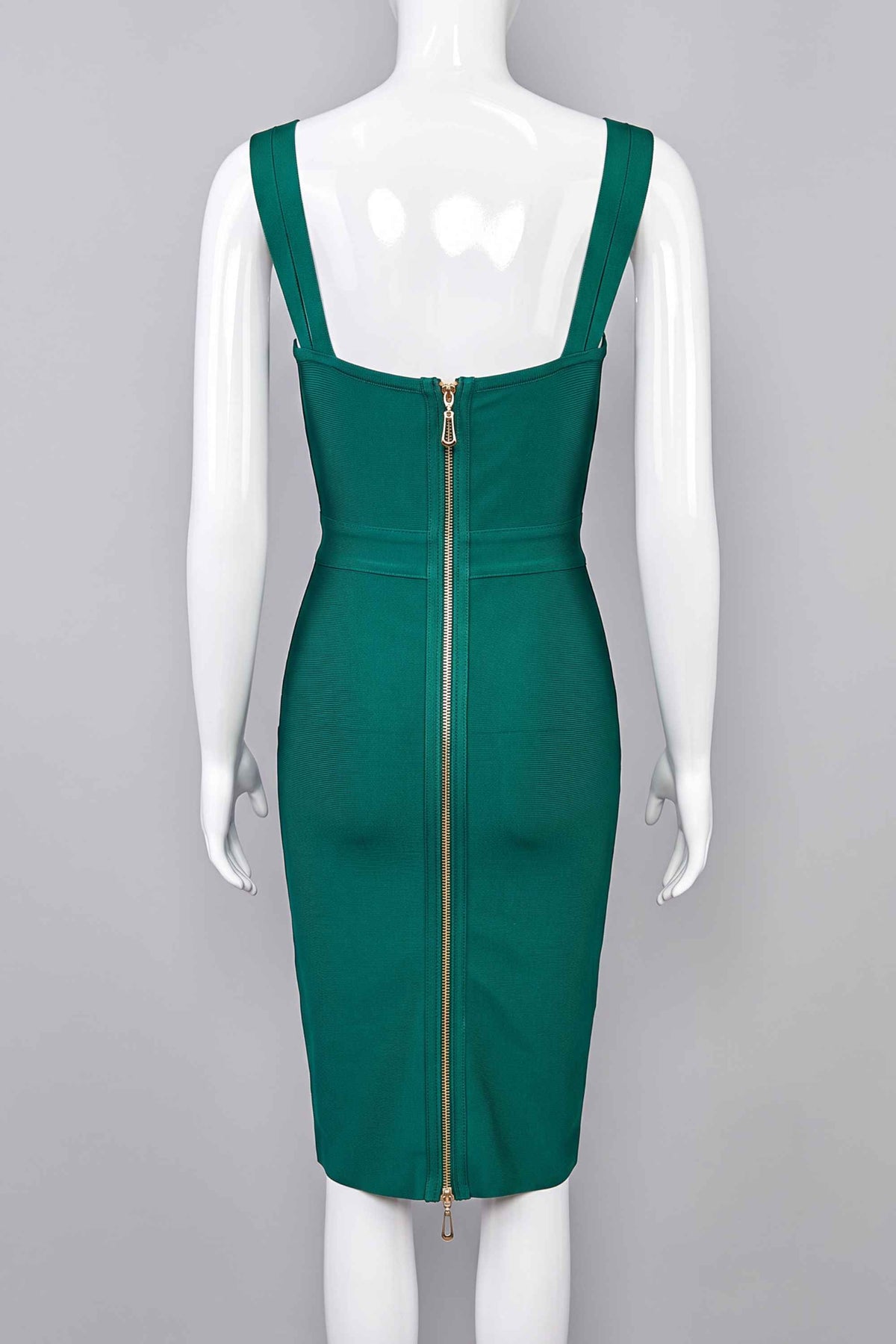 Woman wearing a figure flattering  Kate Bandage Dress - Emerald Green Bodycon Collection