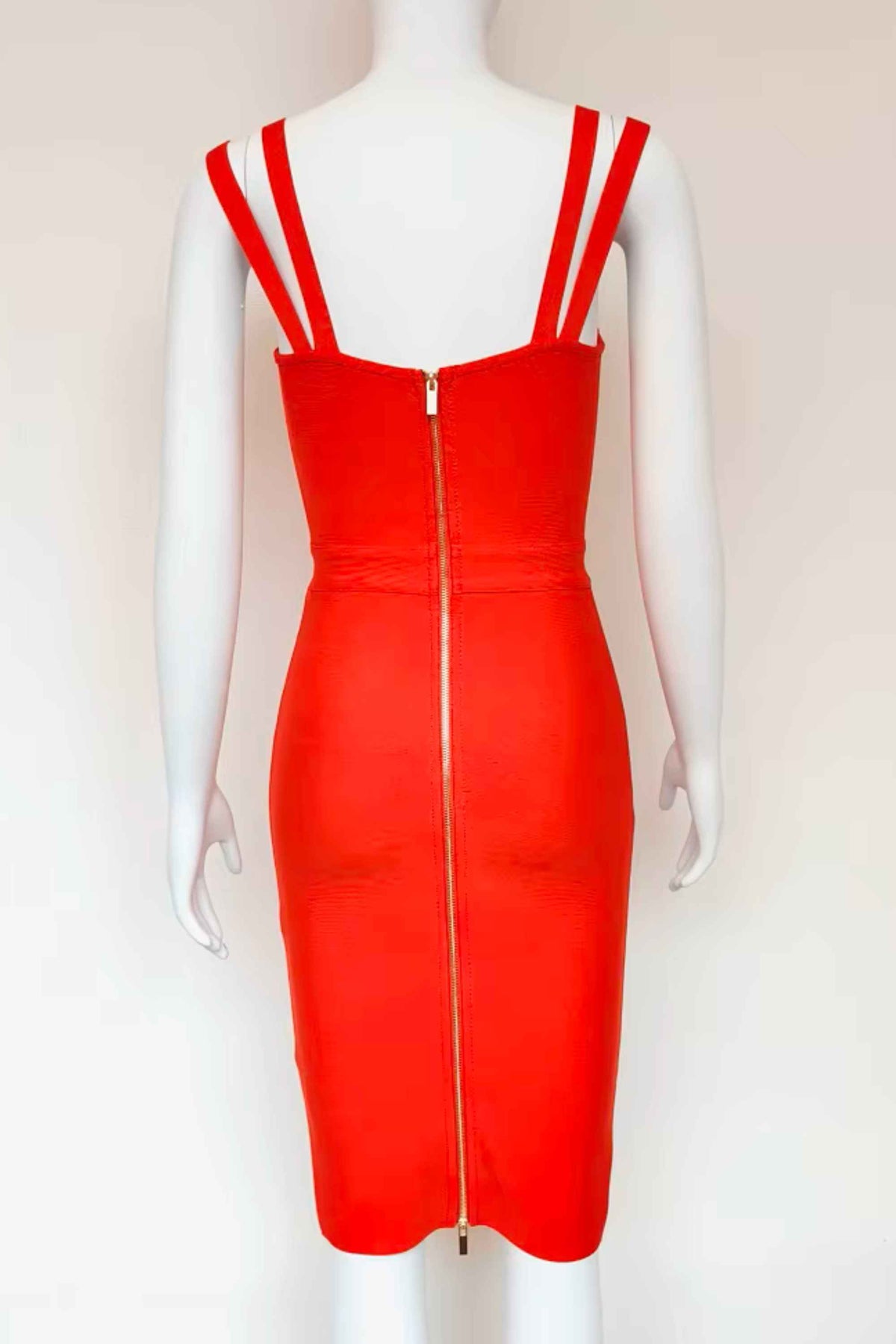 Woman wearing a figure flattering  Kate Bandage Dress - Lipstick Red Bodycon Collection