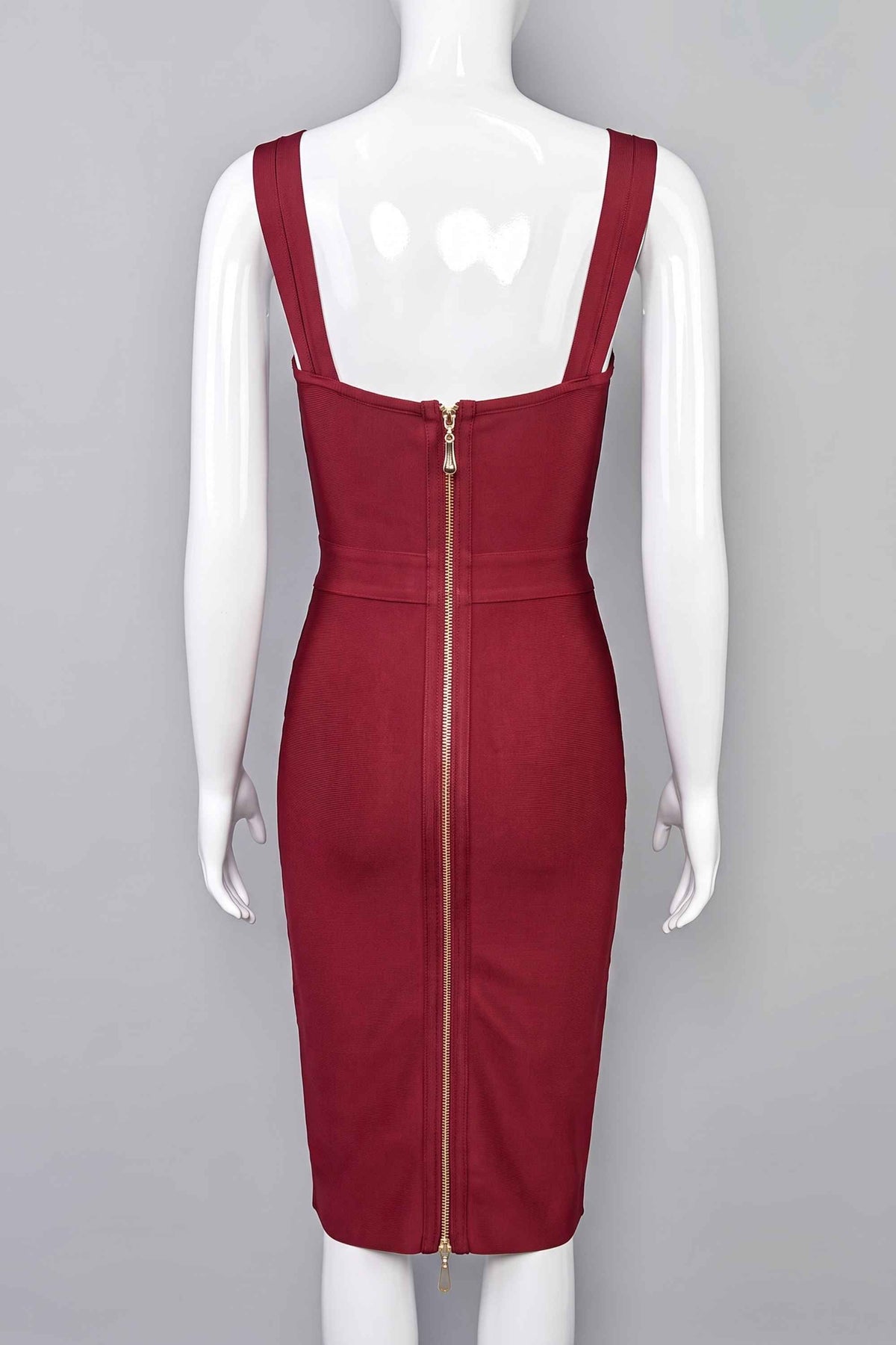Woman wearing a figure flattering  Kate Bandage Dress - Red Wine Bodycon Collection