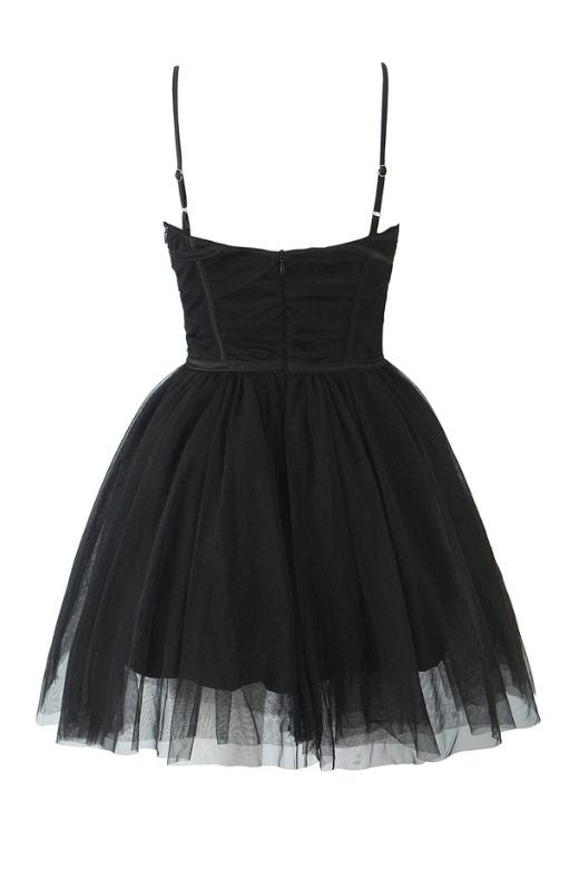 Woman wearing a figure flattering  Kaya Bodycon Mini Wrap Tulle Dress - Classic Black BODYCON COLLECTION