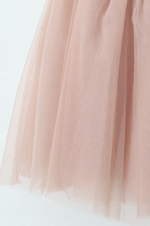 Woman wearing a figure flattering  Kaya Bodycon Mini Wrap Tulle Dress - Oyster Pink BODYCON COLLECTION