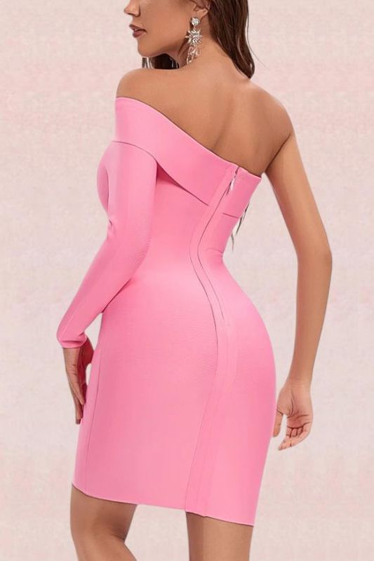 Woman wearing a figure flattering  Kelly Long Sleeve Bandage Dress - Hot Pink BODYCON COLLECTION