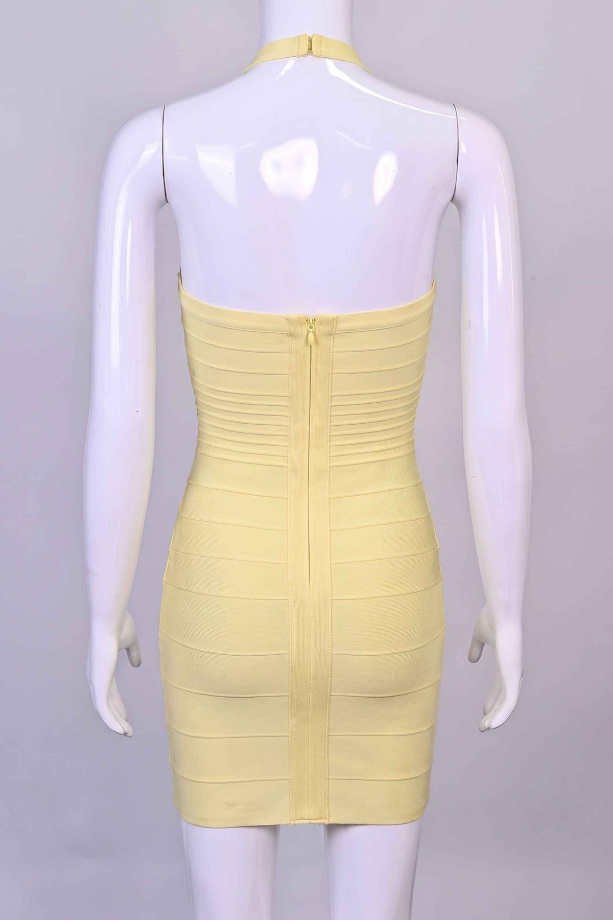 Woman wearing a figure flattering  Kia Bandage Mini Dress - Butter Yellow BODYCON COLLECTION Pty Ltd