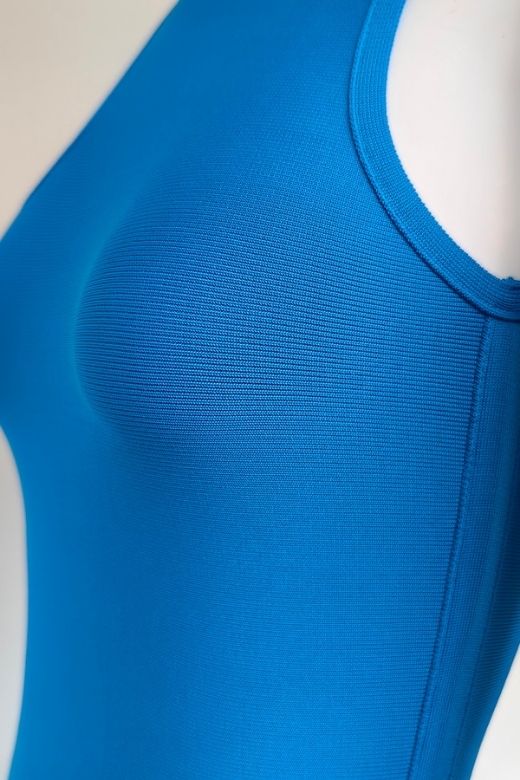 Woman wearing a figure flattering  Layla Bandage Midi Dress - Sky Blue Bodycon Collection