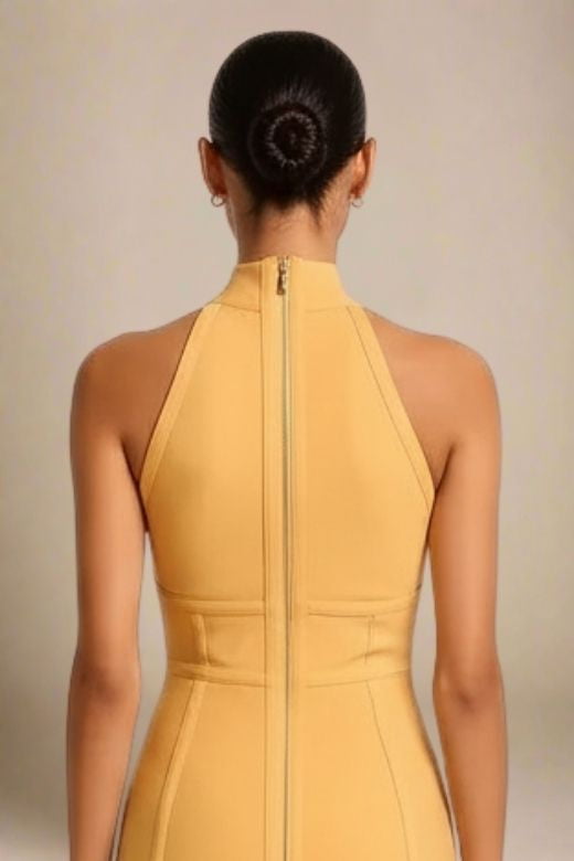 Woman wearing a figure flattering  Lea Bandage Midi Dress - Mustard Yellow Bodycon Collection
