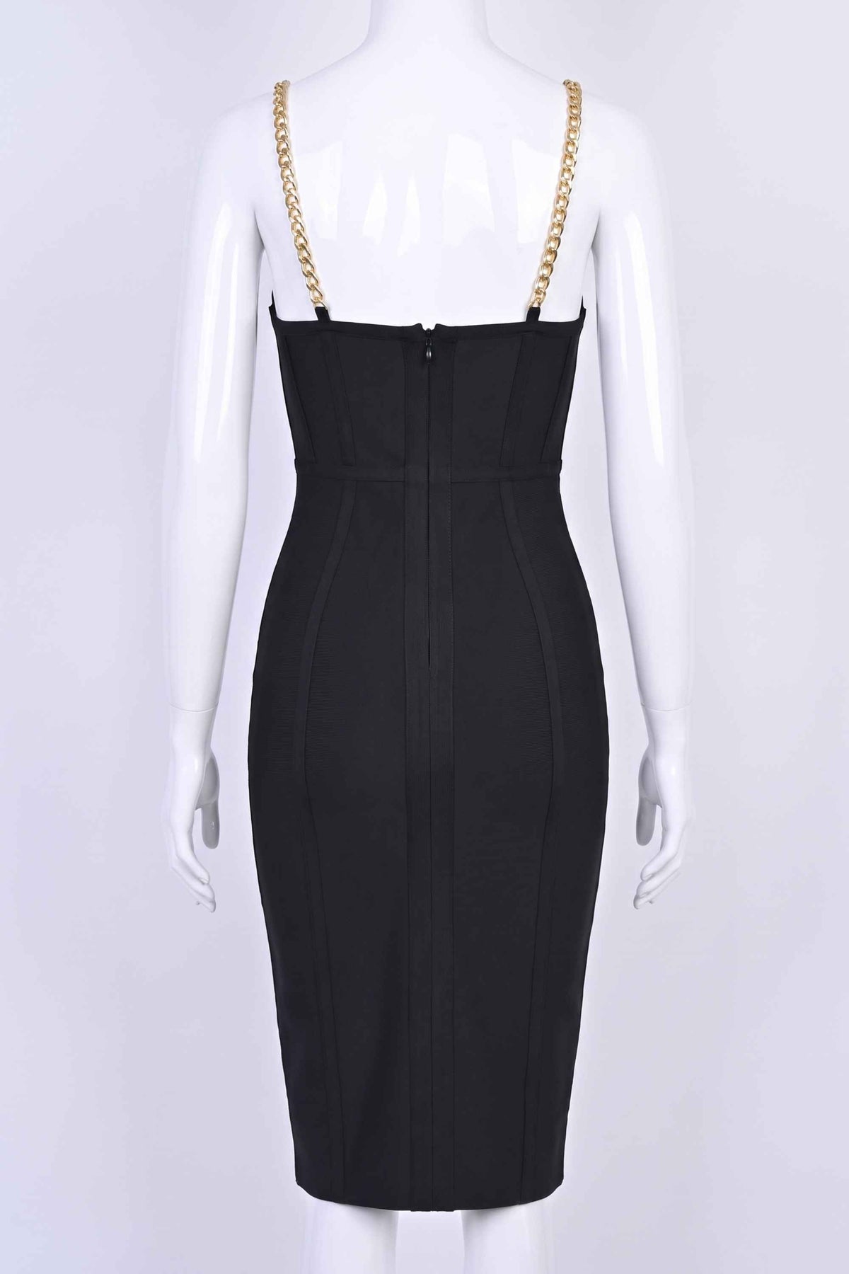 Woman wearing a figure flattering  Leah Bodycon Dress - Classic Black Bodycon Collection