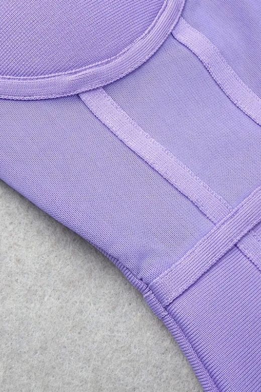 Woman wearing a figure flattering  Leah Bodycon Dress - Violet Purple Bodycon Collection