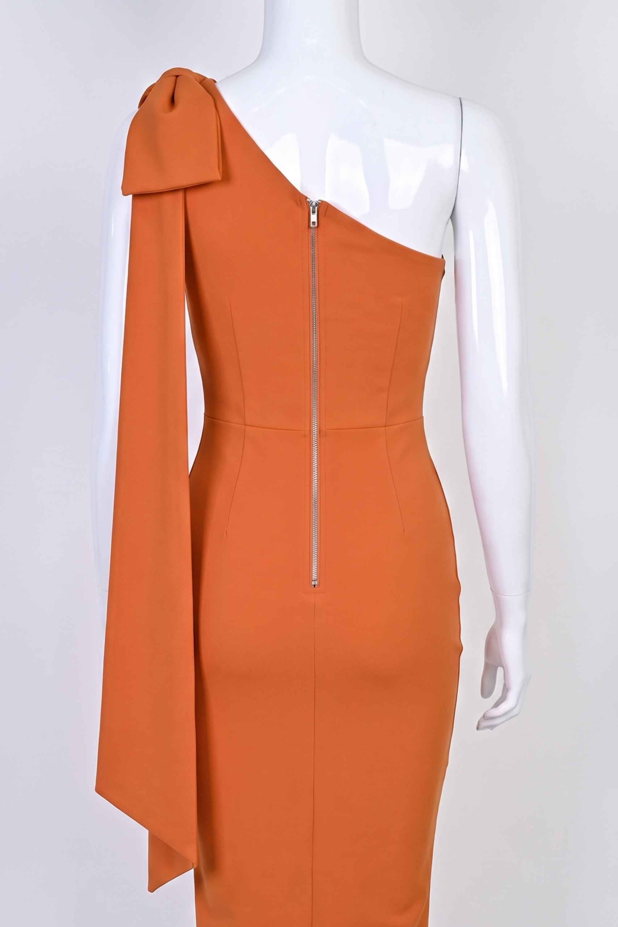 Woman wearing a figure flattering  Lela Long Sleeve Bandage Midi Dress - Apricot Orange BODYCON COLLECTION