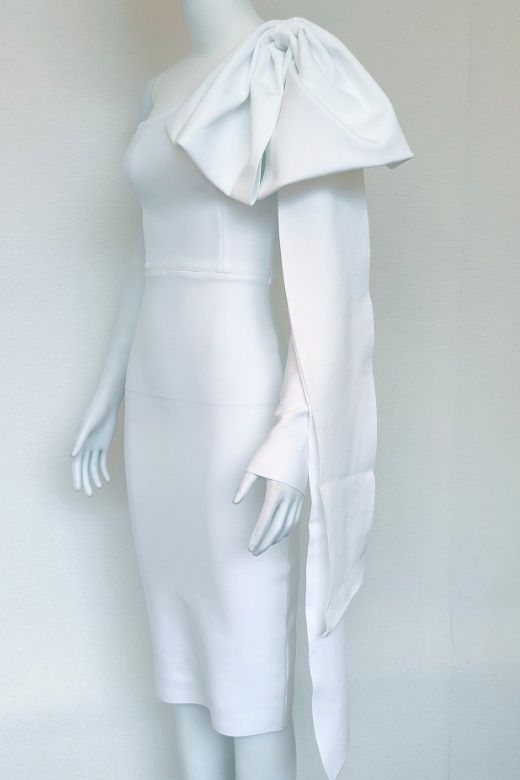 Woman wearing a figure flattering  Lela Long Sleeve Bandage Midi Dress - White Pearl BODYCON COLLECTION