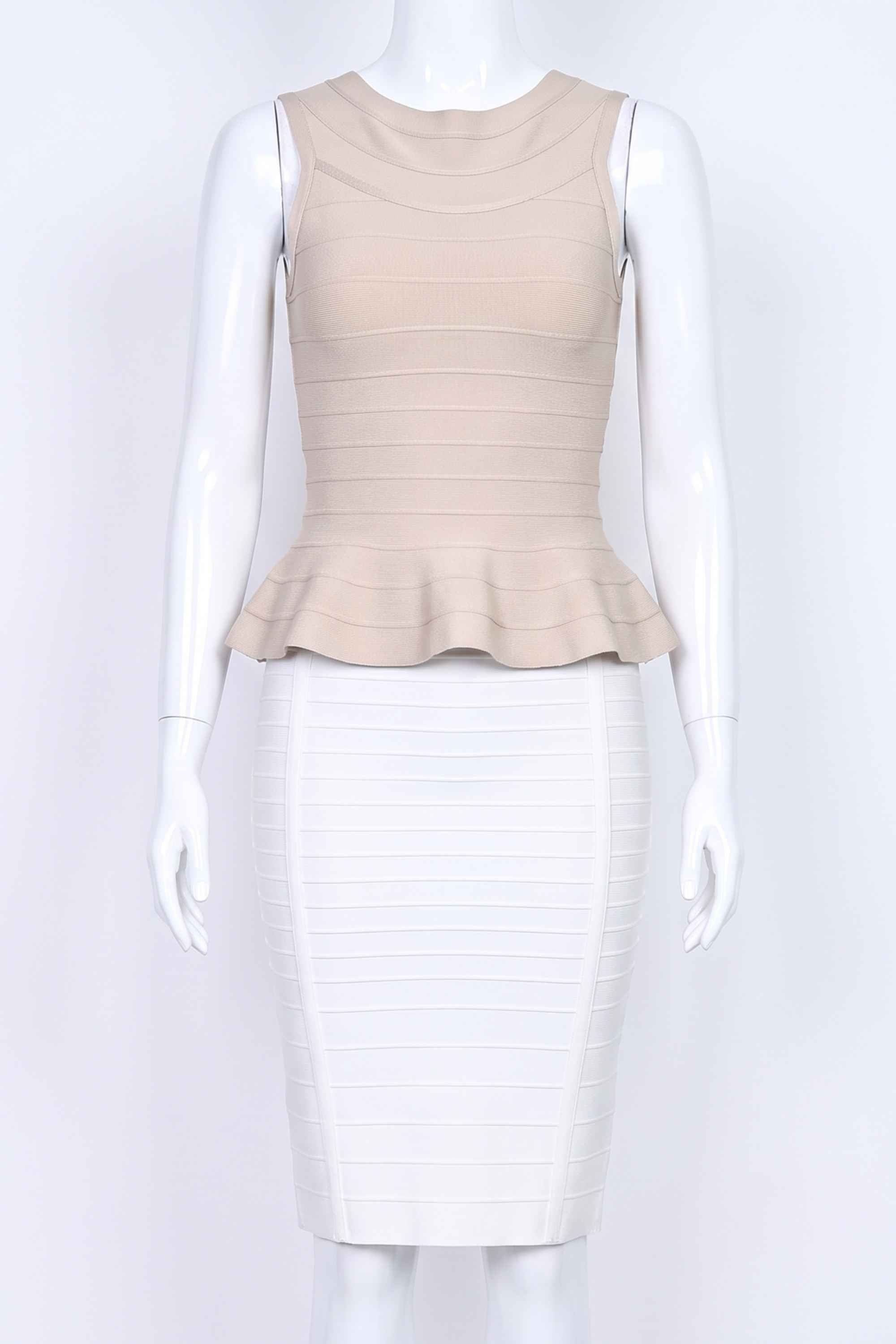 Woman wearing a figure flattering  Leni Bandage Peplum Top - Beige BODYCON COLLECTION