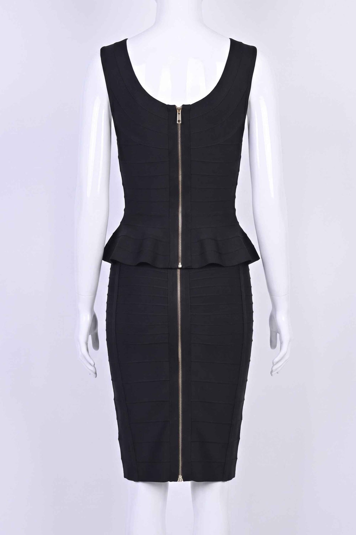Woman wearing a figure flattering  Leni Bandage Top and Knee Length Skirt Set - Classic Black BODYCON COLLECTION