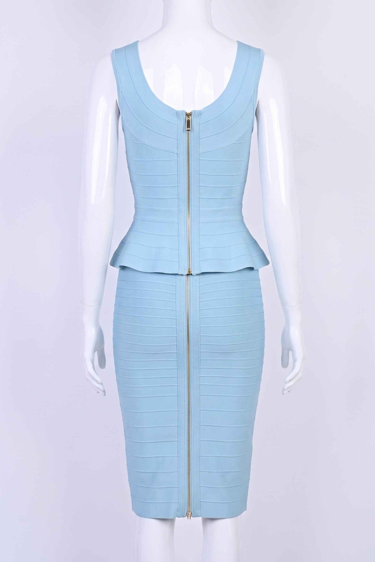 Woman wearing a figure flattering  Leni Bandage Top and Knee Length Skirt Set - Sky Blue BODYCON COLLECTION