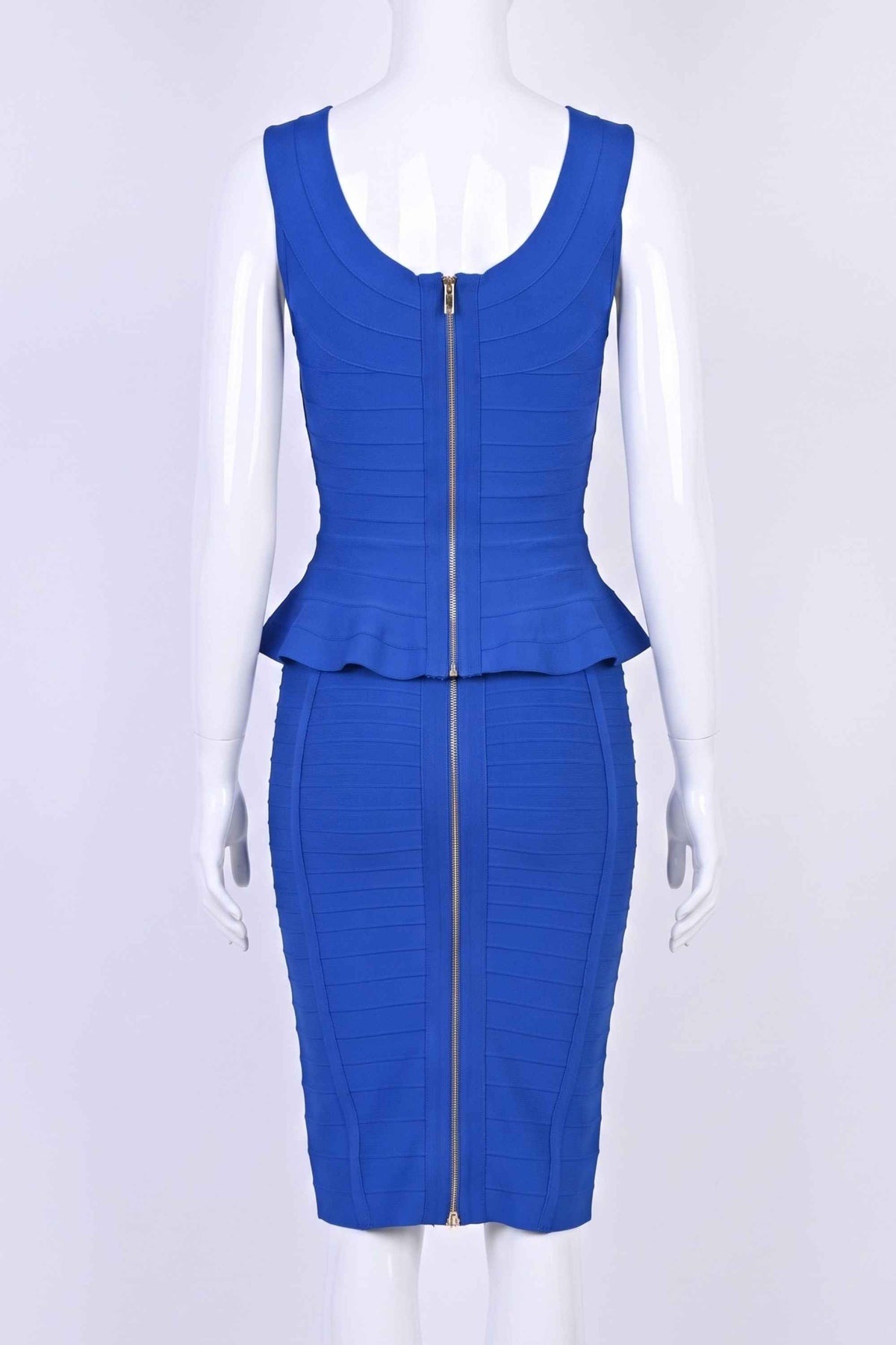 Woman wearing a figure flattering  Leni Bandage Top - Royal Blue BODYCON COLLECTION