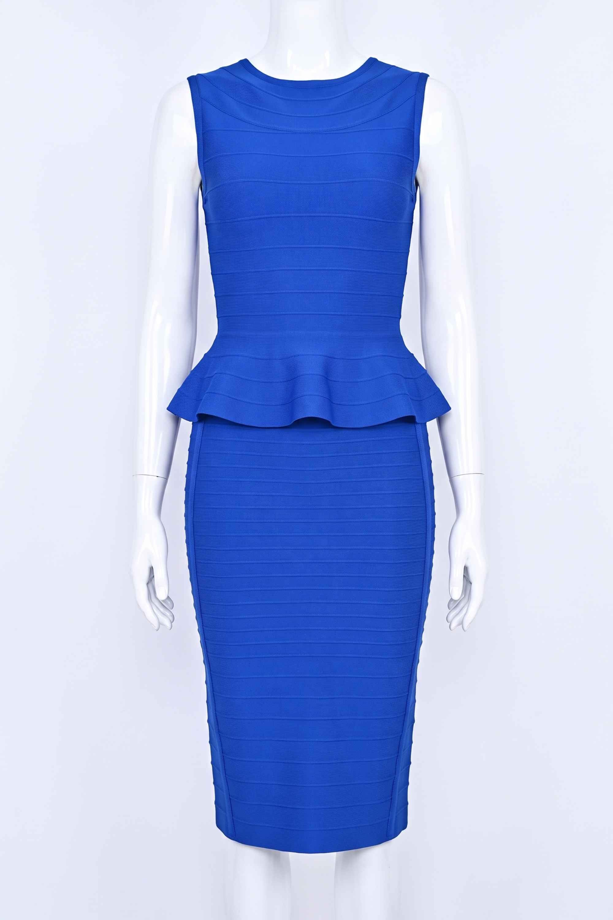 Woman wearing a figure flattering  Leni Bandage Top - Royal Blue BODYCON COLLECTION