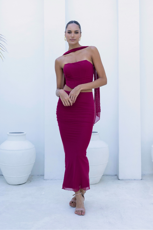 Woman wearing a figure flattering  Margot Wrap Top and Maxi Skirt Outfit Set - Red Wine BODYCON COLLECTION