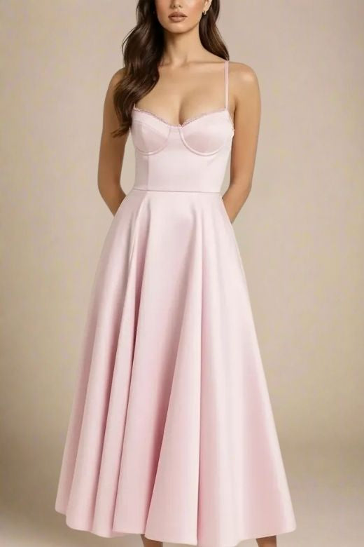 Woman wearing a figure flattering  Mavis Bodycon Midi Dress - Dusty Pink BODYCON COLLECTION