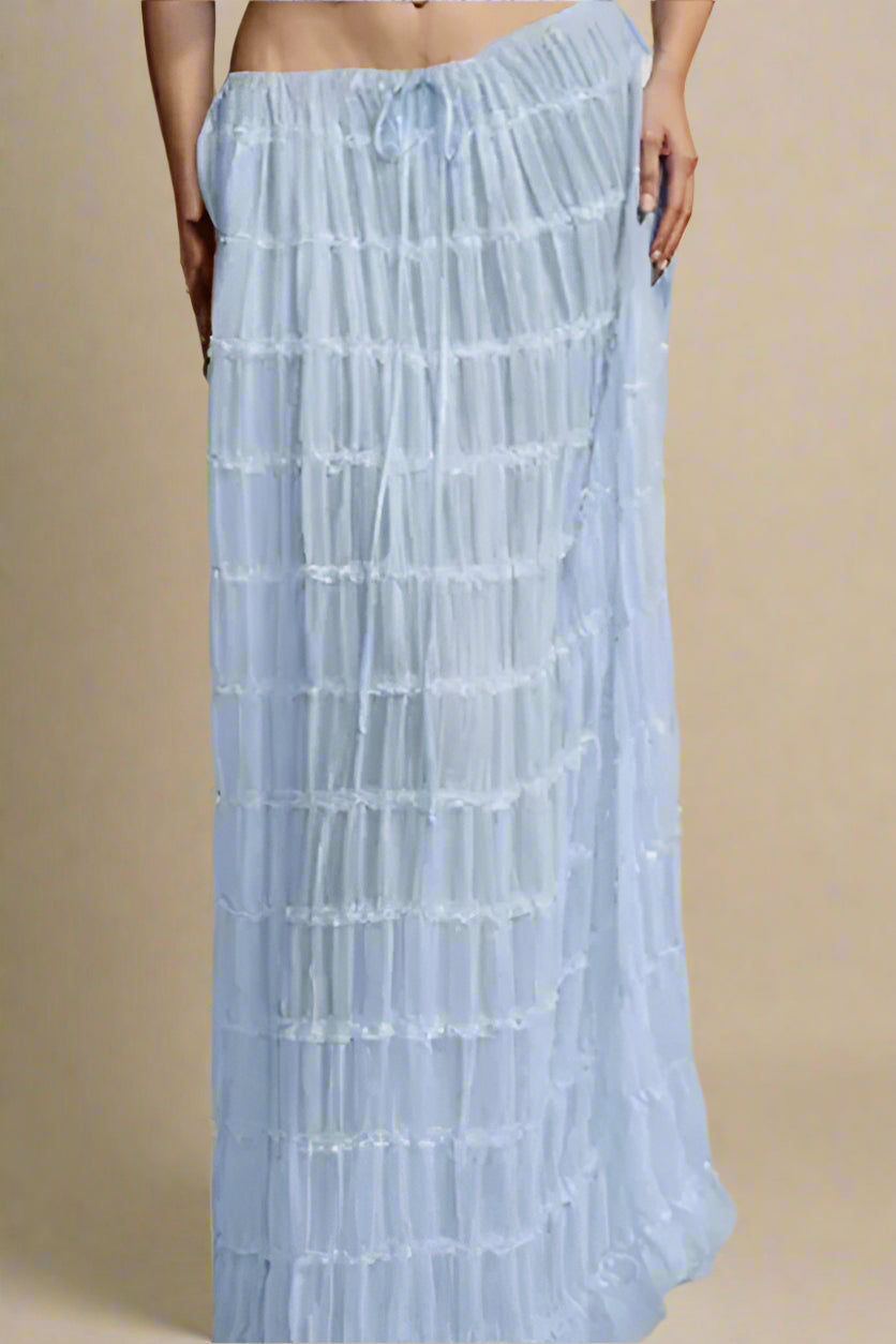 Woman wearing a figure flattering  Meryl Wrap Top and Maxi Skirt Set - Sky Blue BODYCON COLLECTION
