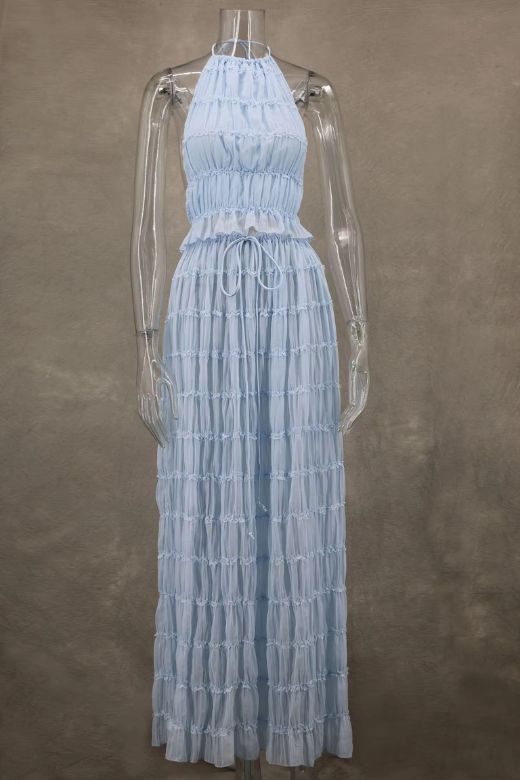 Woman wearing a figure flattering  Meryl Wrap Top and Maxi Skirt Set - Sky Blue BODYCON COLLECTION