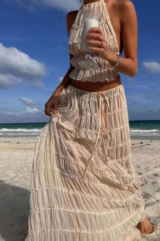 Woman wearing a figure flattering  Meryl Wrap Top and Maxi Skirt Set - Sky Blue BODYCON COLLECTION
