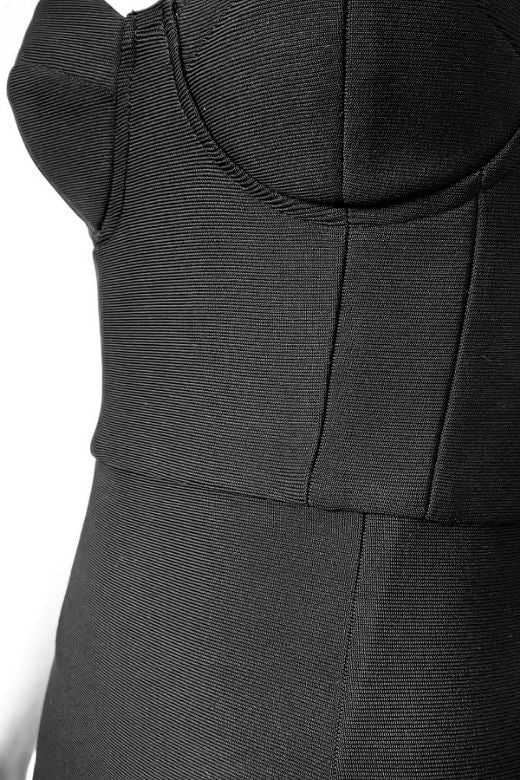 Woman wearing a figure flattering  Mia Bodycon Midi Dress - Classic Black BODYCON COLLECTION Pty Ltd