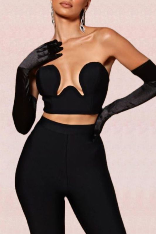 Woman wearing a figure flattering  Mika Bandage Crop Top - Classic Black BODYCON COLLECTION
