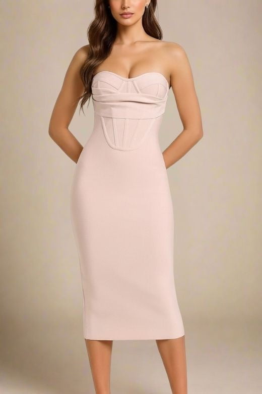 Woman wearing a figure flattering  Miles Bodycon Midi Dress - Nude BODYCON COLLECTION