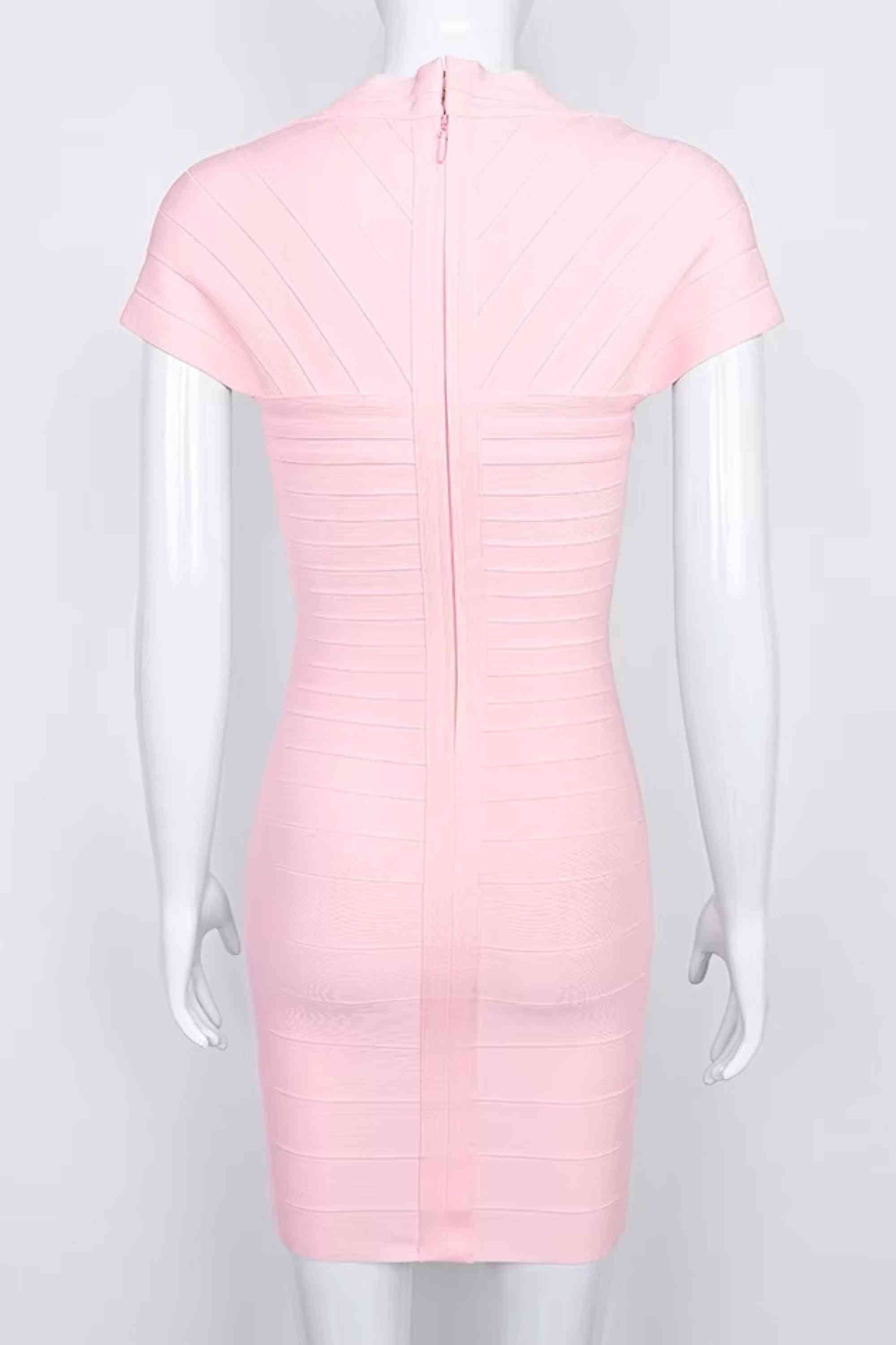 Woman wearing a figure flattering  Miranda Bandage Mini Dress - Dusty Pink Bodycon Collection