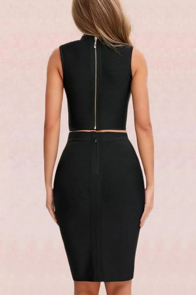 Woman wearing a figure flattering  Misty Bandage Top and Skirt Set - Classic Black BODYCON COLLECTION